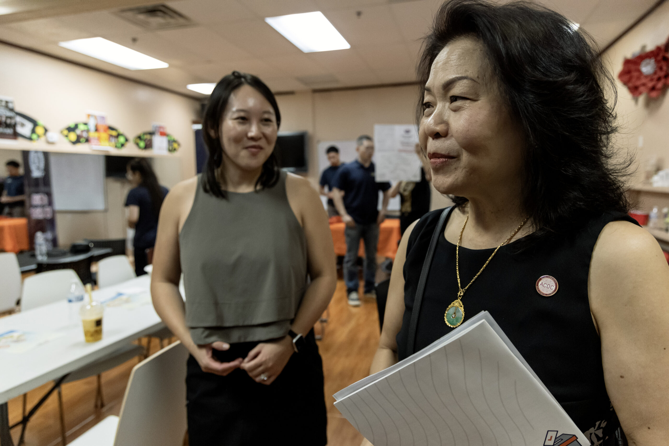 Vida Lin, right, founder of the Asian Community Development Council, talks with Chloe Kwan, the group’s director of strategic initiatives, during the annual Dragon Boat Festival in Las Vegas on Wednesday, June 5, 2024. (Photo by Christopher Lomahquahu/News21)