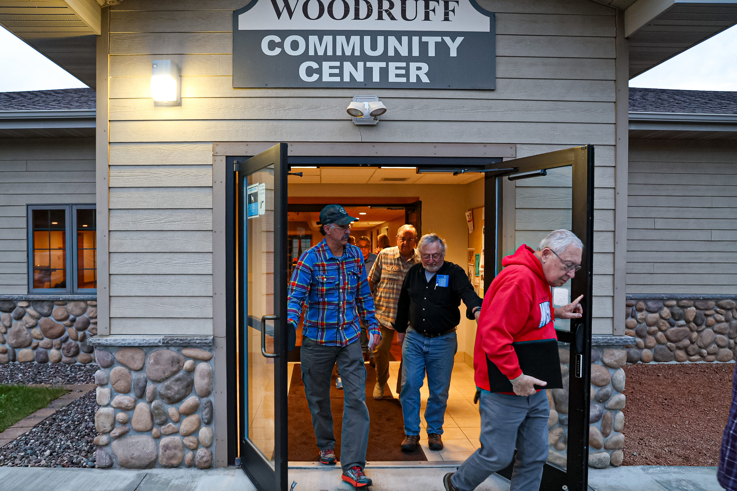 Community members exit the town hall in Woodruff, Wis., after a Keep Our Republic civic education event on Thursday, June 6, 2024. (Photo by Donovan Johnson/News21)