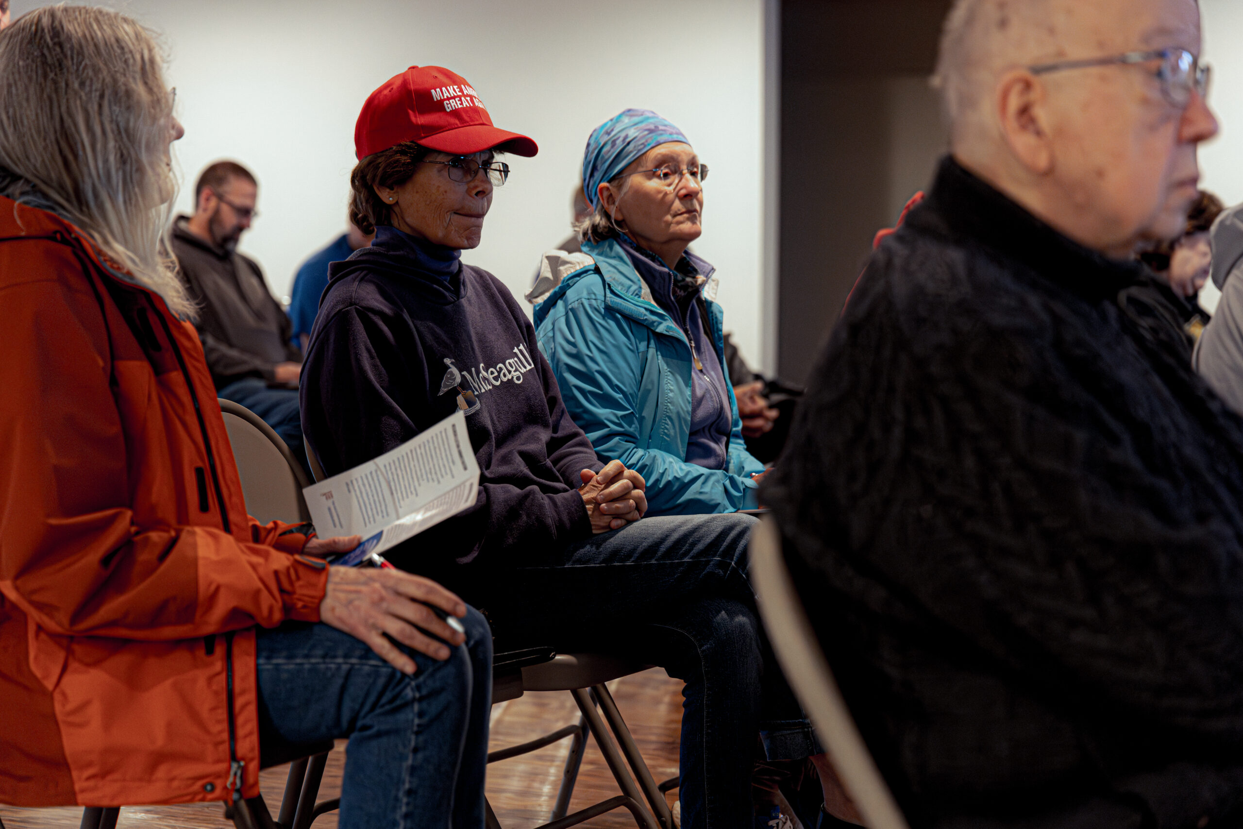 Terry Capsay wears a “Make America Great Again” cap as she and other residents listen to a presentation by the voter education group Keep Our Republic event in Woodruff, Wis., on Thursday, June 6, 2024. (Photo by Donovan Johnson/News21)