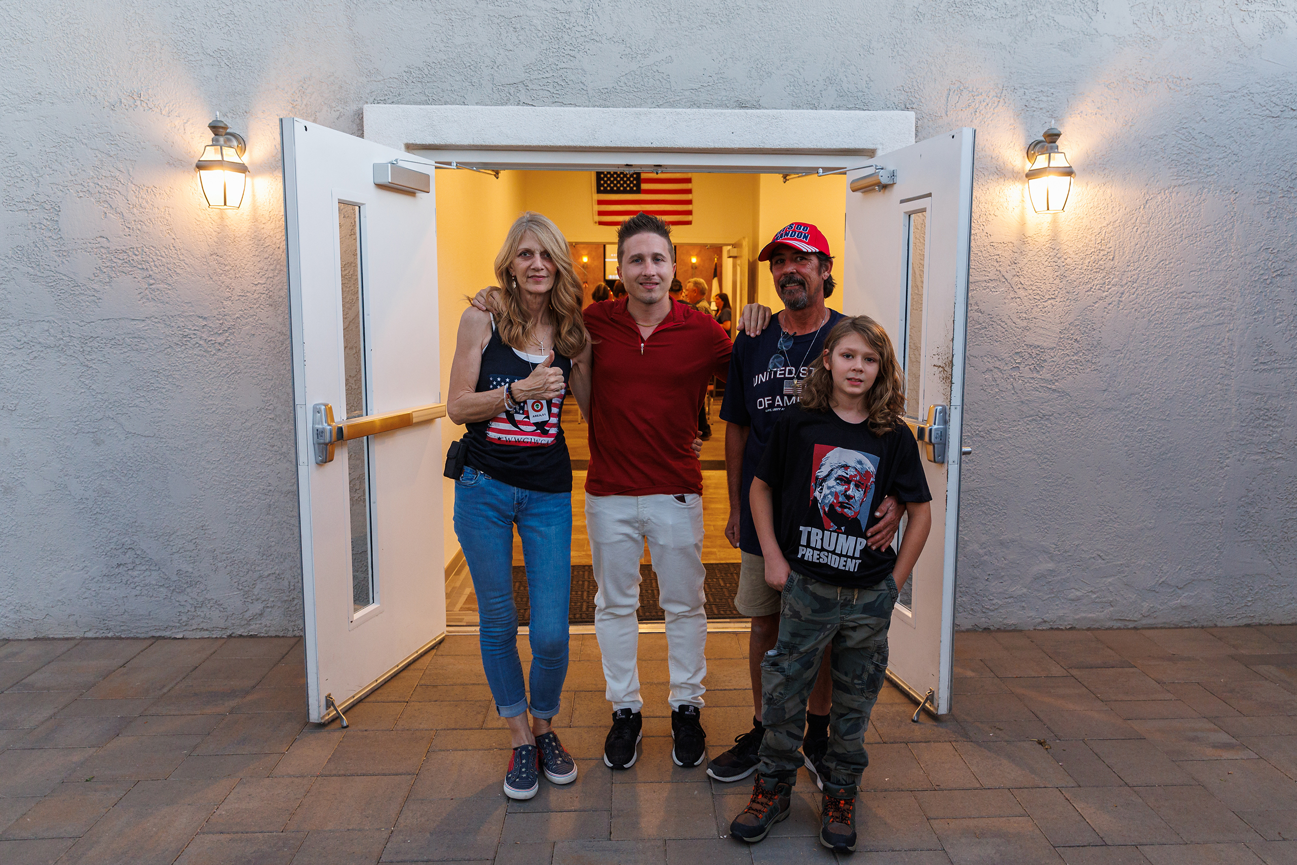 Nathan DeGrave poses with, from left to right, Kristen Ditto, Mike Hutchings and R.J. Hutchings after a screening of “Let My People Go,” a documentary about Jan. 6ers, at a church in Henderson, Nev., on June 28, 2024. (Photo by Hudson French/News21)