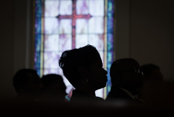 Attendees of an Alabama NAACP voter participation event sit in the pews of New Bayside Baptist Church in Mobile, on June 15, 2024. The event begins and ends with a prayer to encourage people to vote. (Photo by Jordan Moore/News21)